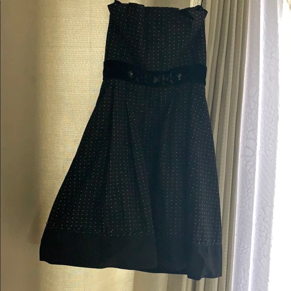 Bcbg maxazria Black midi dress with poko dots.